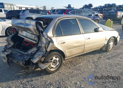1997 Toyota Corolla Dx z USA, uszkodzony, nr VIN 2T1BB02E0VC193887
